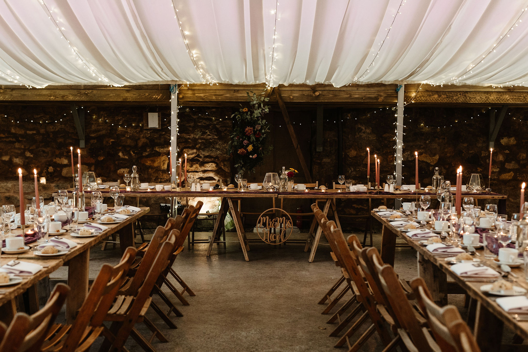 top table with triangle arch in Cowshed Crail barn venue in Fife
