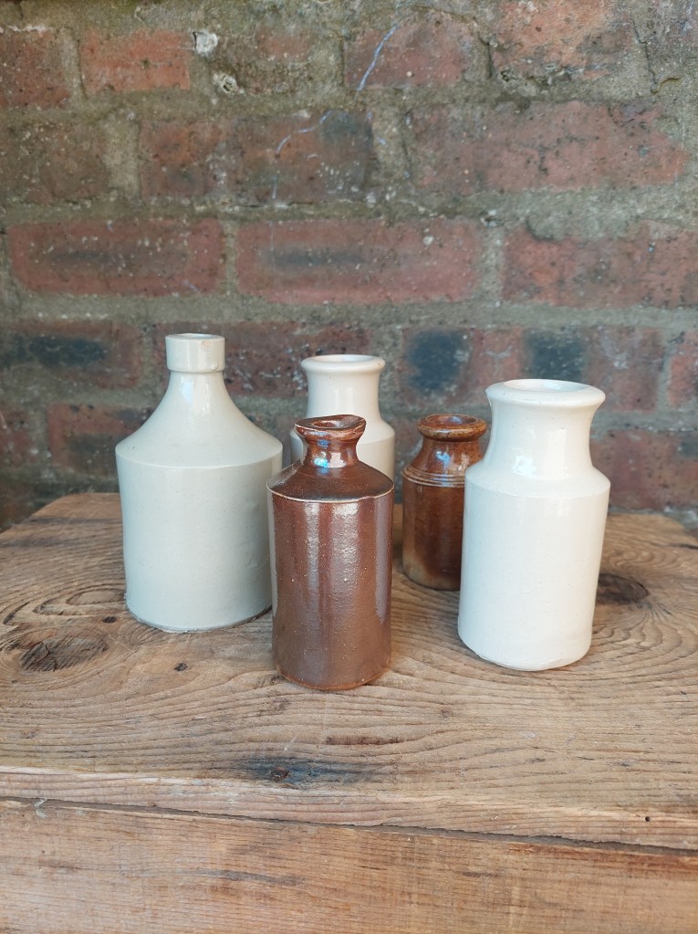 Vintage stone bottle vases for weddings in Scotland